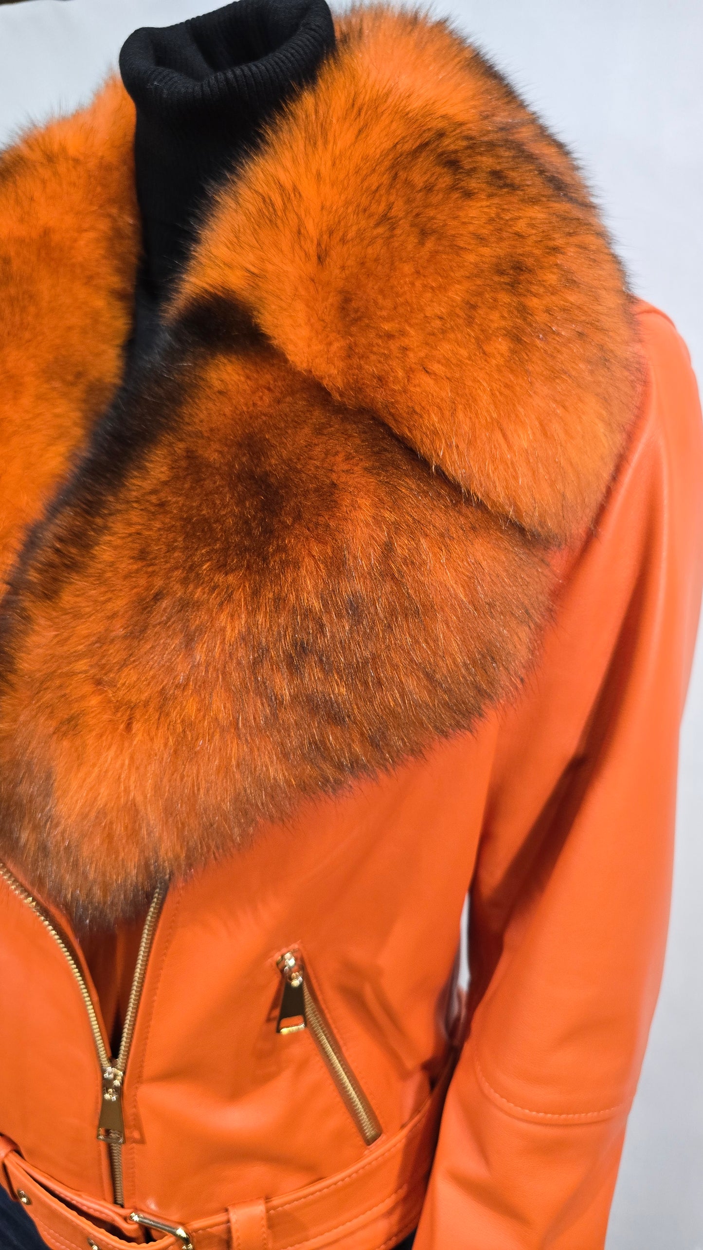High Fashion Orange lambskin butter soft leather jacket with Fox fur.