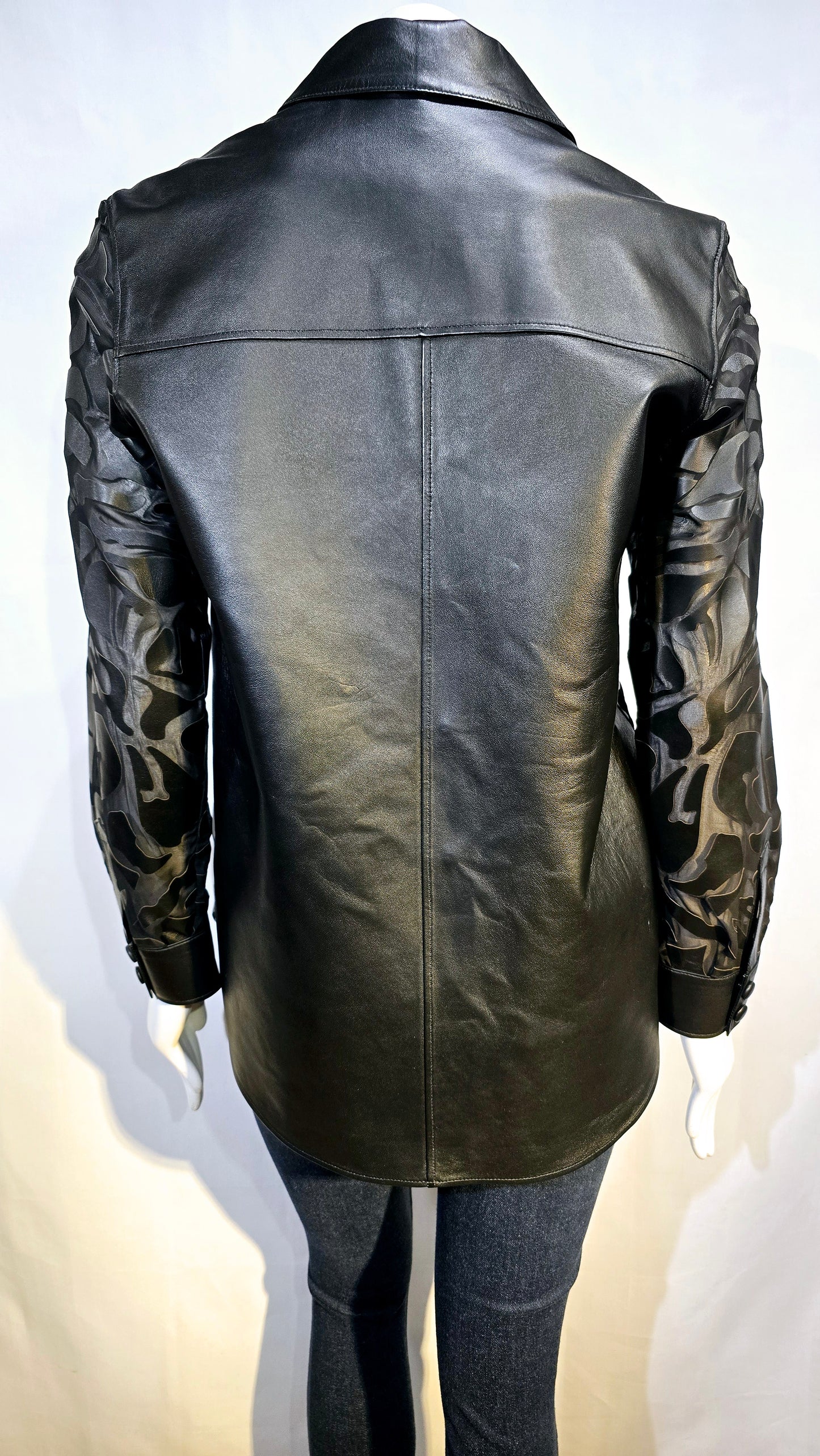 Amazing quality burnt out design lambskin leather blouse with snap button.
