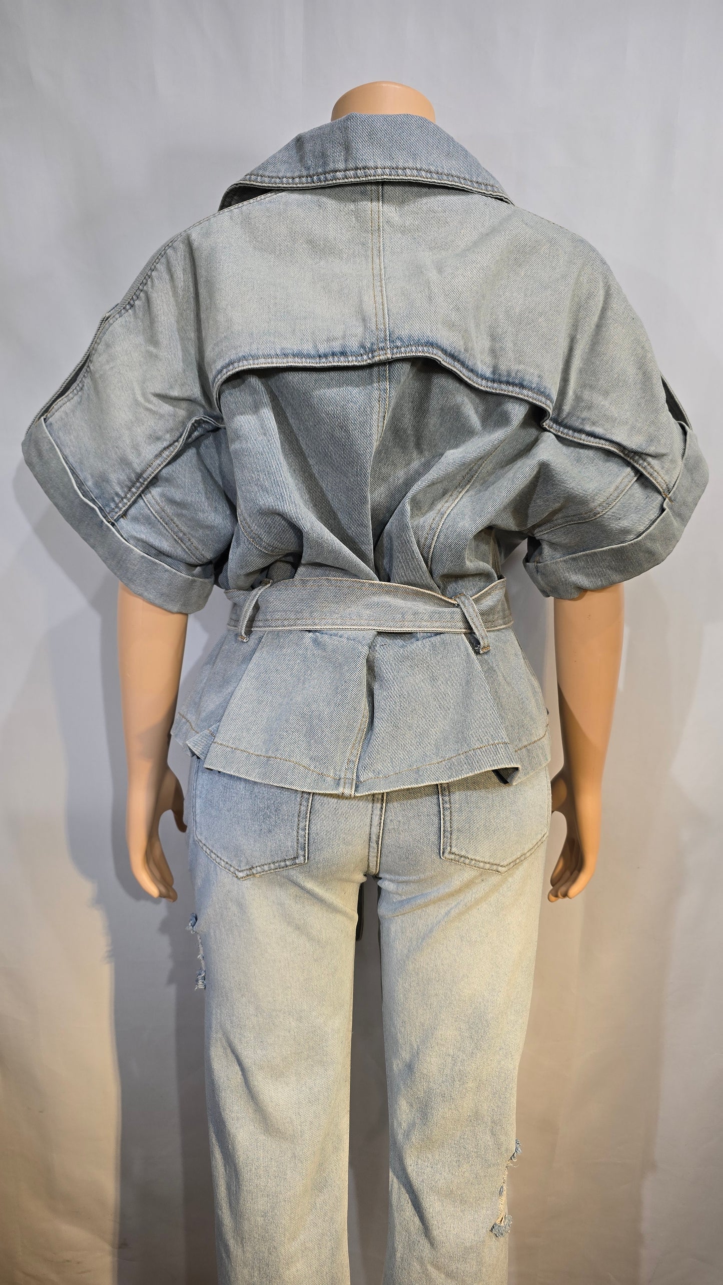 Fashionable oversized denim shirt/ jacket with denim belt.