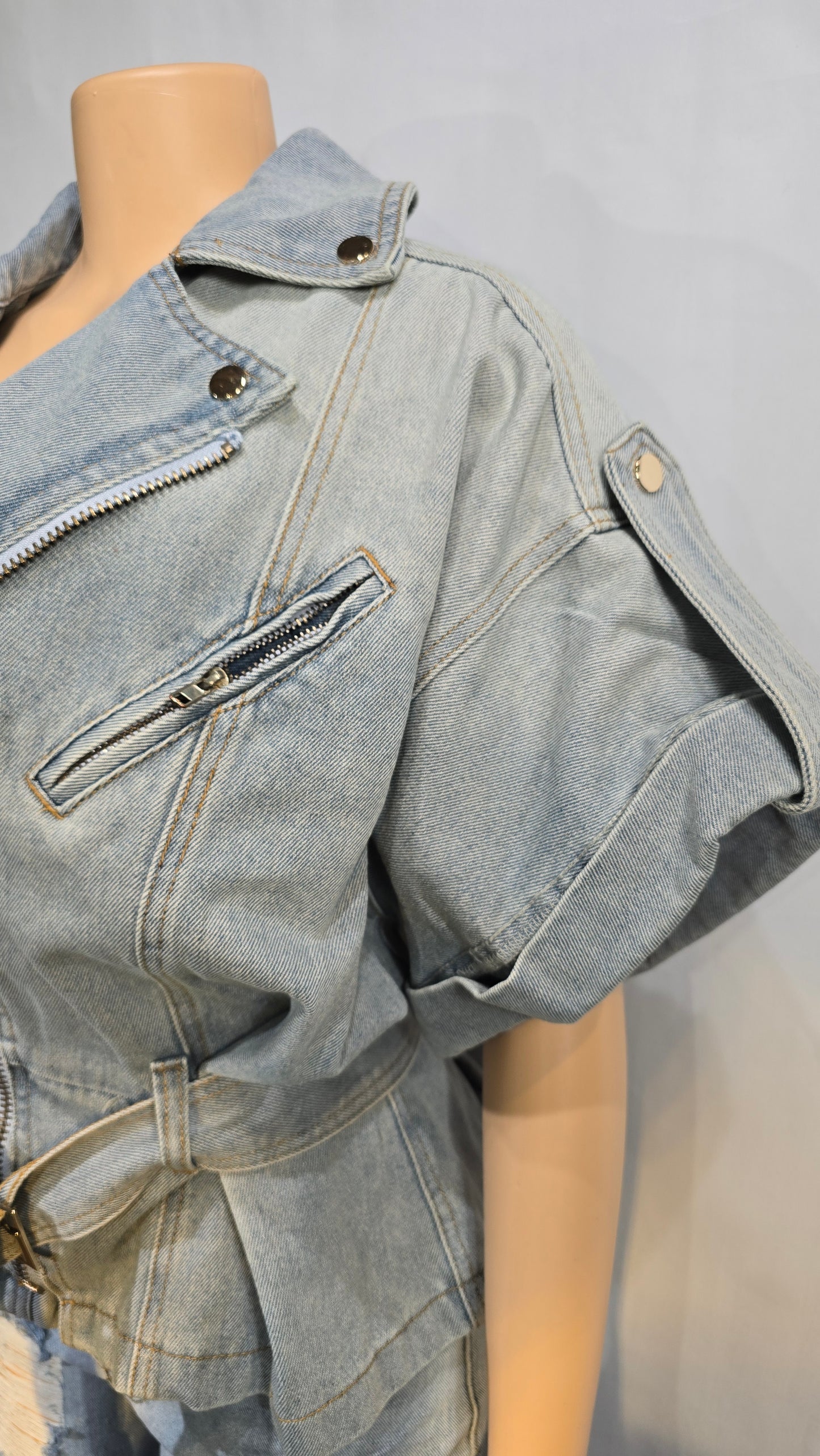 Fashionable oversized denim shirt/ jacket with denim belt.