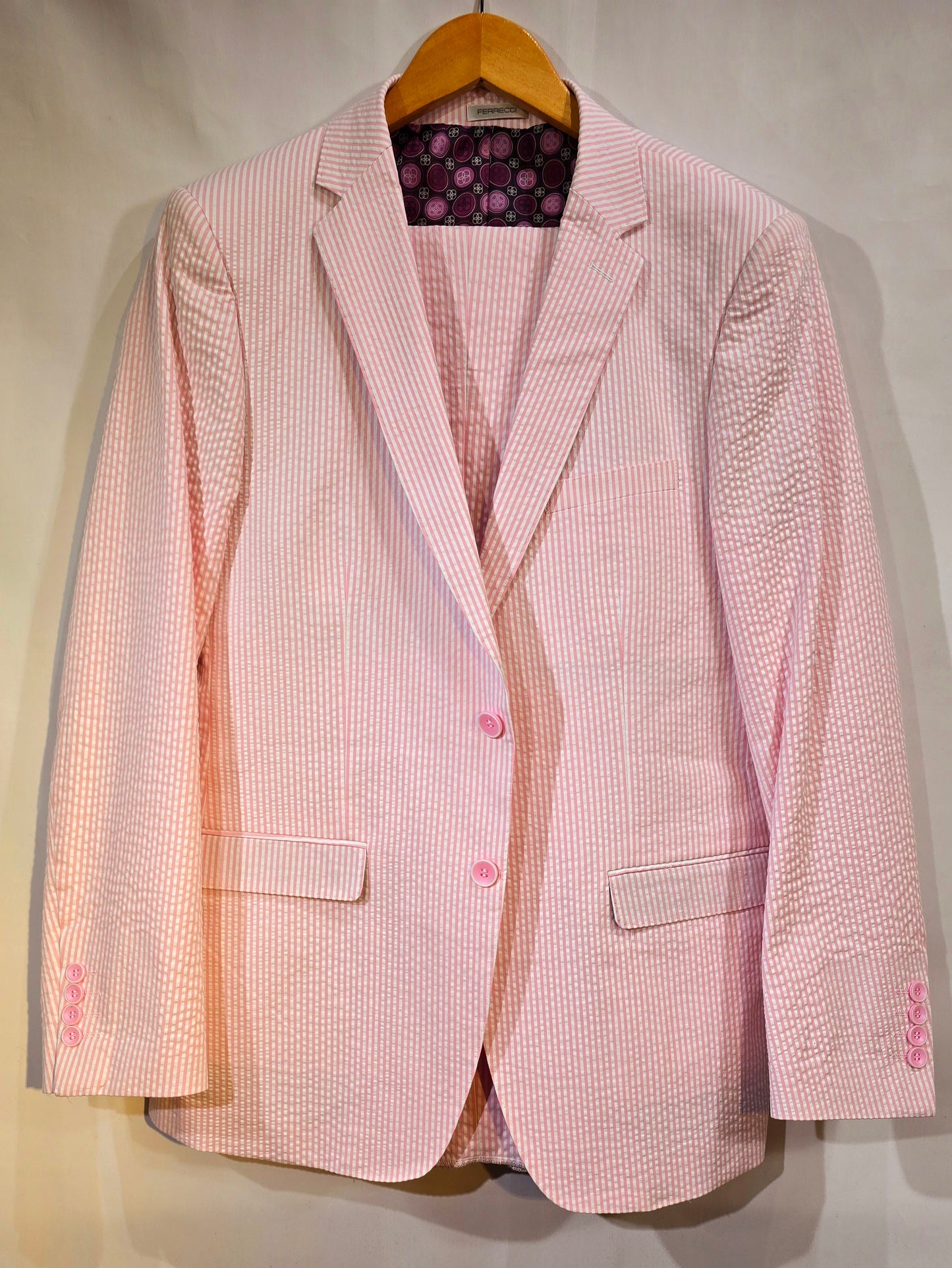 Summer ready. Fashionable, comfortable classic 2 button seersucker suit. Available in Banana yellow, soft pink, classic blue & classic Tan. Great for Summer weddings, outdoor events and summer cruises.
