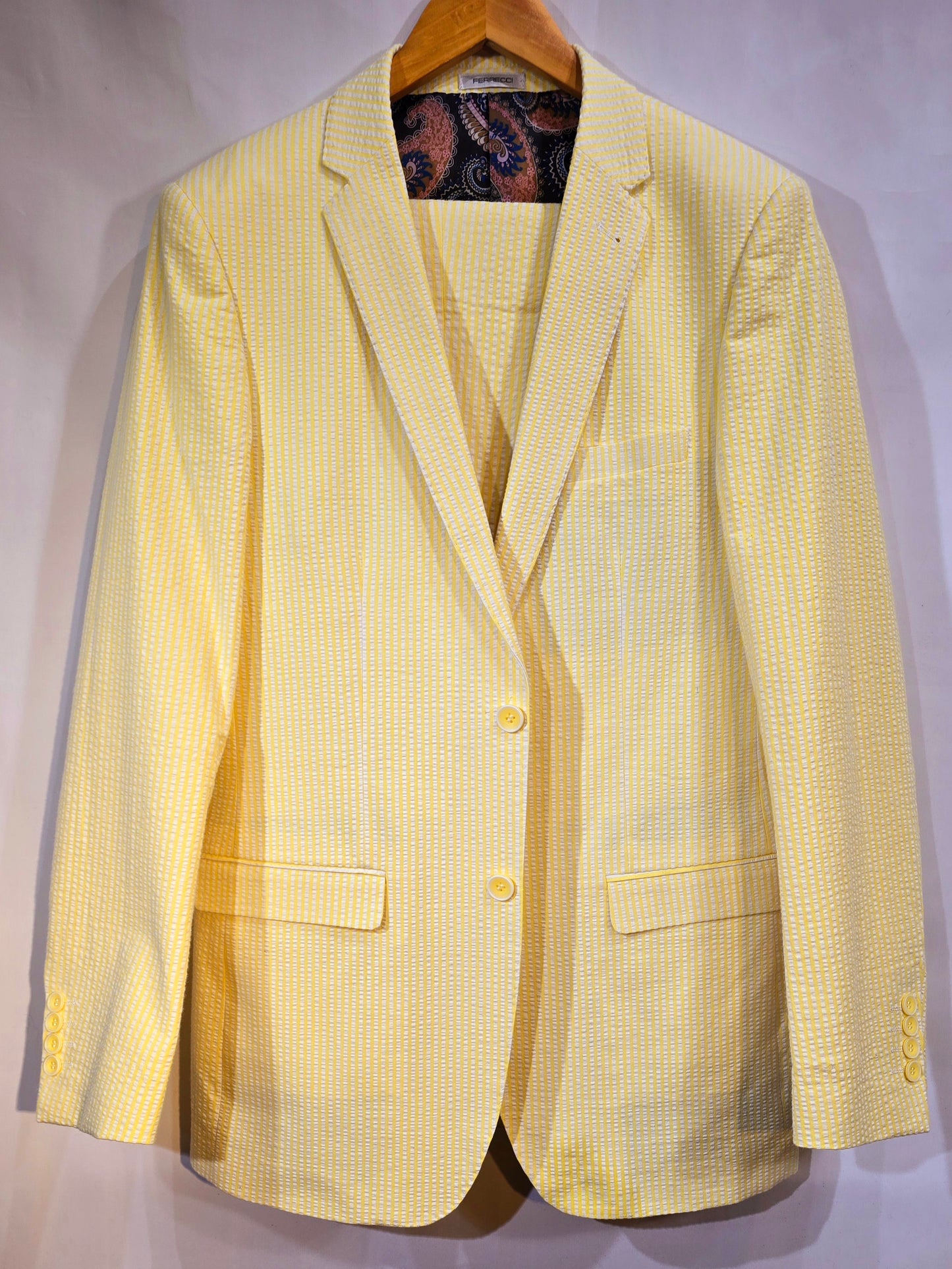 Summer ready. Fashionable, comfortable classic 2 button seersucker suit. Available in Banana yellow, soft pink, classic blue & classic Tan. Great for Summer weddings, outdoor events and summer cruises.