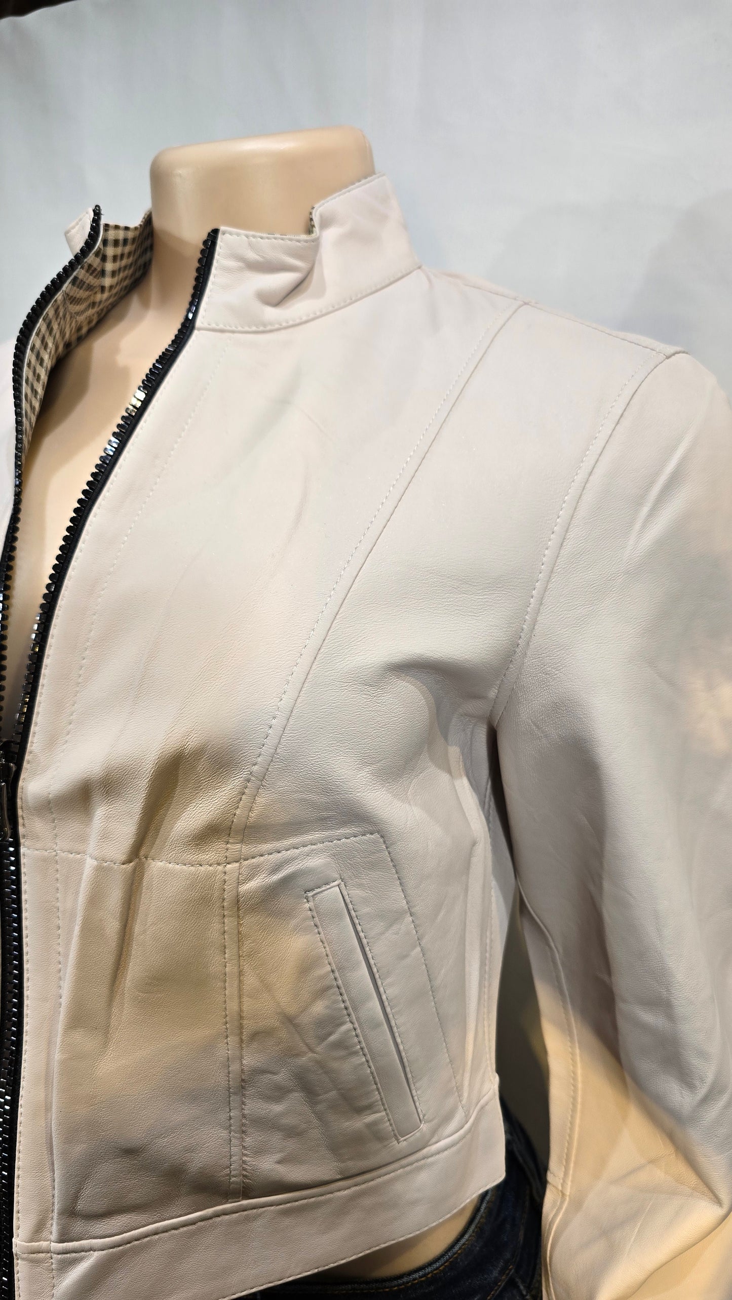 Off white lambskin leather high bikers jacket.