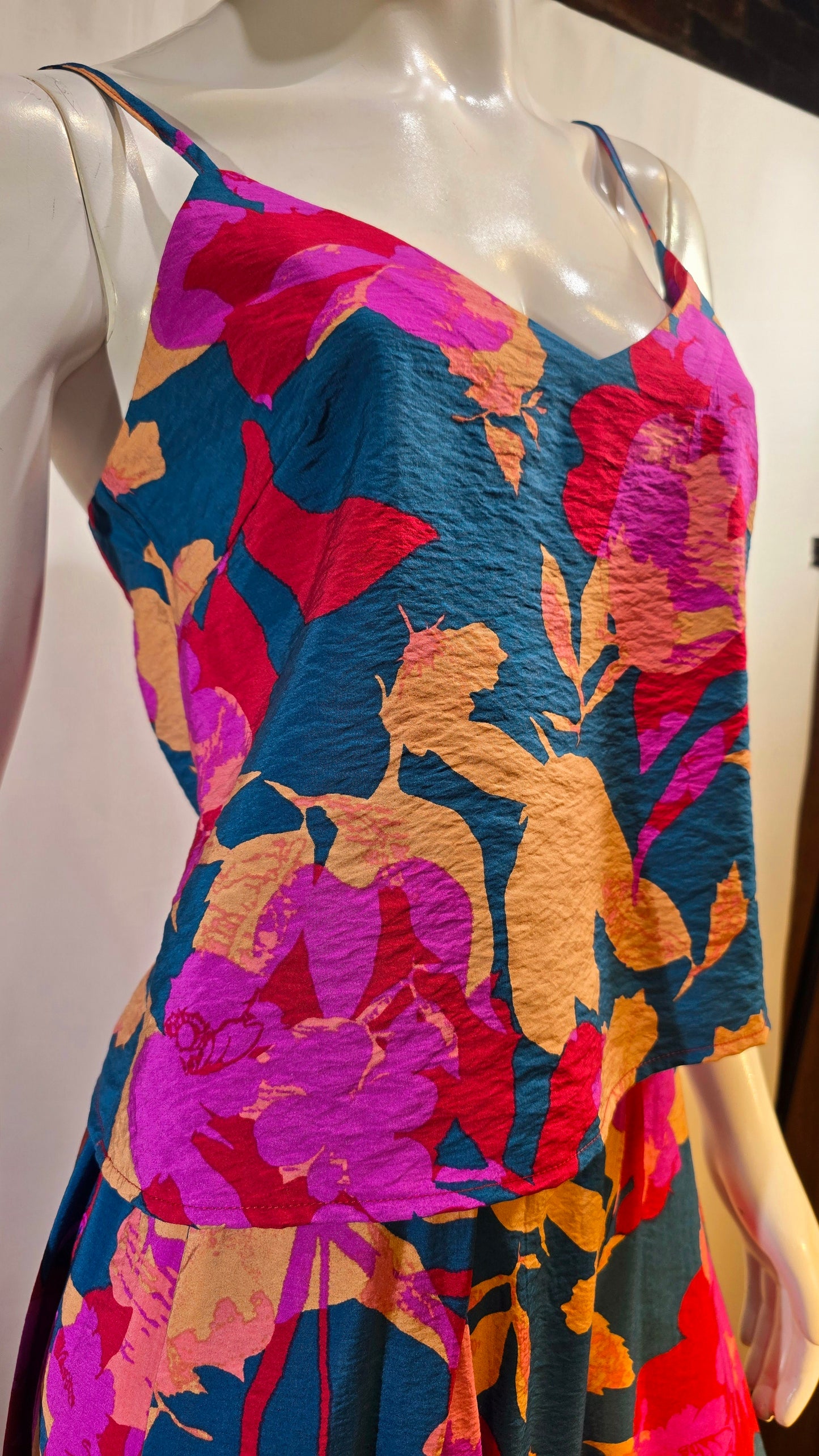 2pc summer set. This casual look is made with Summer in mind. Light weight material with red, tan & teal color combinations.